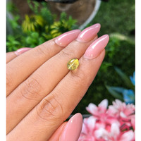 2.33 Ct. Greenish Yellow Cabochon Chrysoberyl from Tanzania Life Style