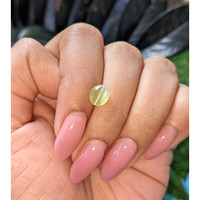 1.88 Ct. Yellowish Green Cabochon Chrysoberyl from Tanzania Life Style