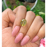 6.63 Ct. Yellowish Green Cabochon Chrysoberyl from Tanzania Life Style