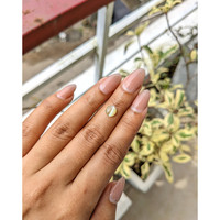 1.11 Ct. Greenish Yellow Cabochon Chrysoberyl from Ceylon (Sri Lanka) Life Style