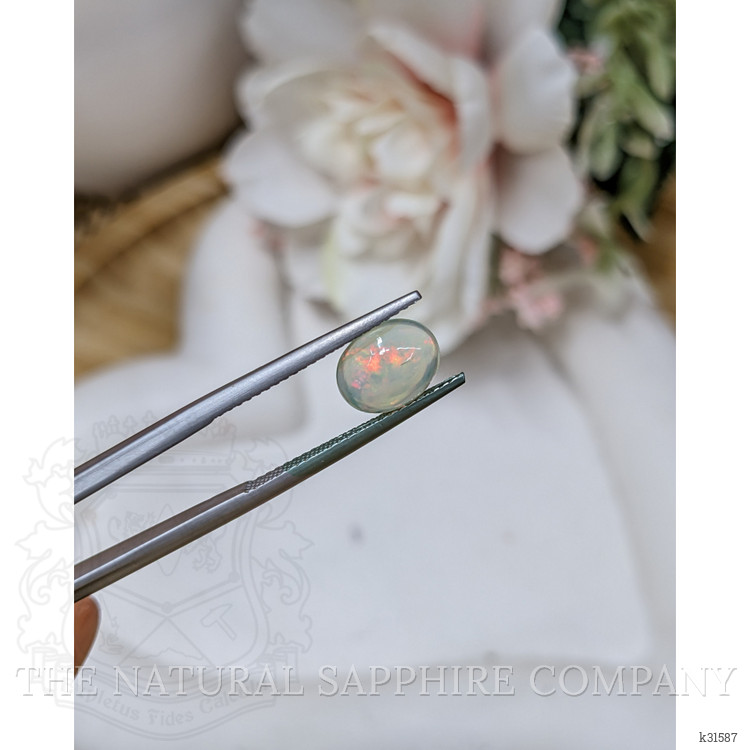1.02 Ct. Multi Color Cabochon Fire Opal (Flame Opal) from Brazil