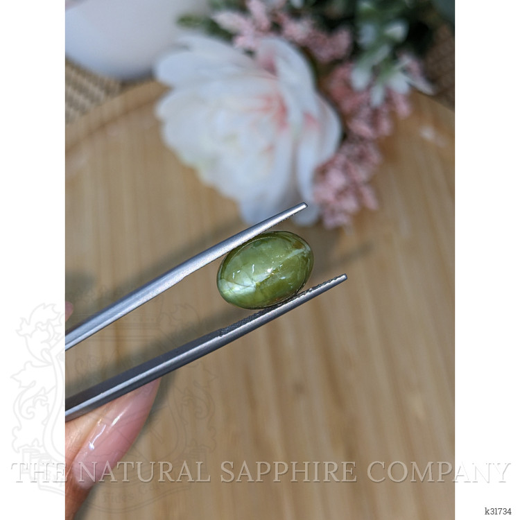 11.81 Ct. Yellowish Green Cabochon Chrysoberyl from Ceylon (Sri Lanka)