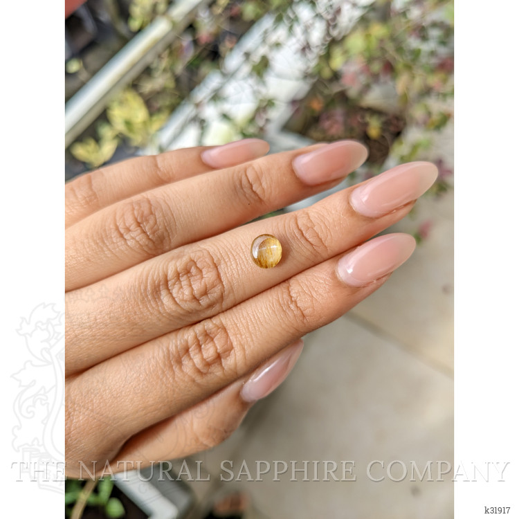 1.53 Ct. Yellowish Brown Cabochon Chrysoberyl from Ceylon (Sri Lanka)