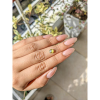 1.27 Ct. Greenish Yellow Cabochon Chrysoberyl from Ceylon (Sri Lanka) Life Style