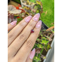 0.98 Ct. Purplish Red Rhodolite Garnet from Mozambique Life Style