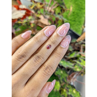 0.74 Ct. Pinkish Purple Cabochon Garnet from Ceylon (Sri Lanka) Life Style