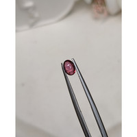 0.55 Ct. Pinkish Purple Cabochon Garnet from Ceylon (Sri Lanka) Life Style