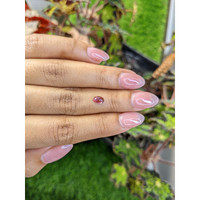 0.55 Ct. Pinkish Purple Cabochon Garnet from Ceylon (Sri Lanka) Life Style