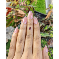 0.60 Ct. Pinkish Purple Cabochon Garnet from Ceylon (Sri Lanka) Life Style