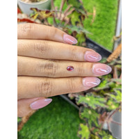 0.65 Ct. Pinkish Purple Cabochon Garnet from Ceylon (Sri Lanka) Life Style