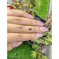 0.67 Ct. Pinkish Purple Cabochon Garnet from Ceylon (Sri Lanka) Life Style