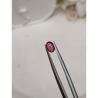 0.67 Ct. Pinkish Purple Cabochon Garnet from Ceylon (Sri Lanka) Life Style