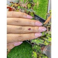 0.69 Ct. Pinkish Purple Cabochon Garnet from Ceylon (Sri Lanka) Life Style