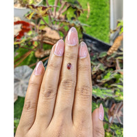 0.69 Ct. Pinkish Purple Cabochon Garnet from Ceylon (Sri Lanka) Life Style