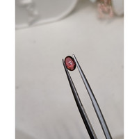 0.69 Ct. Pinkish Purple Cabochon Garnet from Ceylon (Sri Lanka) Life Style