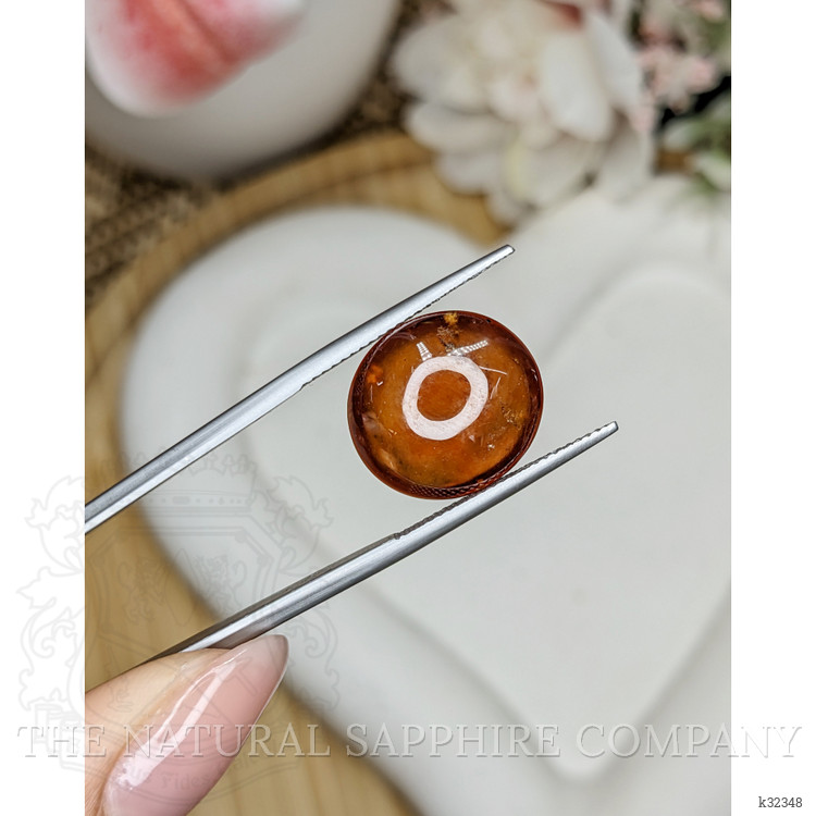 13.29 Ct. Reddish Orange Cabochon Hessonite Garnet from Madagascar