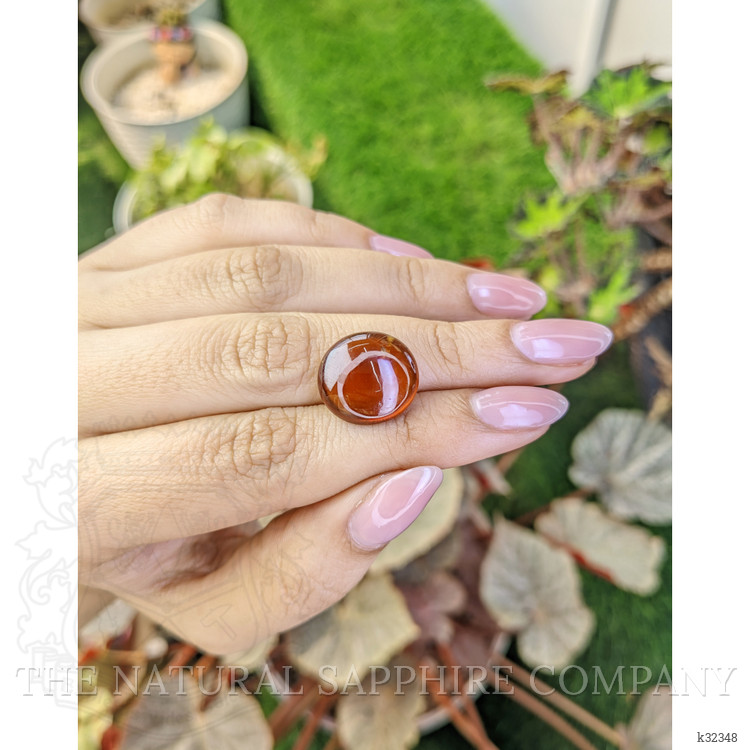 13.29 Ct. Reddish Orange Cabochon Hessonite Garnet from Madagascar