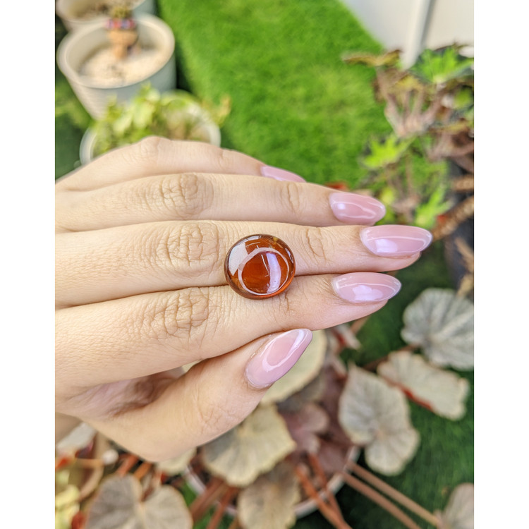 13.29 Ct. Reddish Orange Cabochon Hessonite Garnet from Madagascar