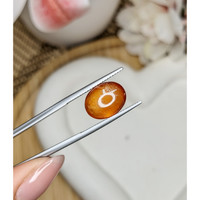 7.38 Ct. Orange Cabochon Hessonite Garnet from Madagascar Life Style