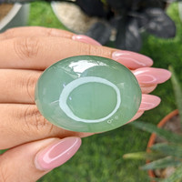 228.07 Ct. Green Cabochon Cat’s Eye Beryl from Ceylon (Sri Lanka) Life Style