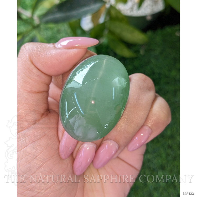 228.07 Ct. Green Cabochon Cat’s Eye Beryl from Ceylon (Sri Lanka)
