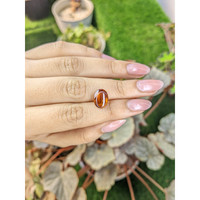 4.37 Ct. Reddish Orange Cabochon Hessonite Garnet from Madagascar Life Style