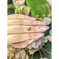2.15 Ct. Orange Cabochon Hessonite Garnet from Madagascar Life Style