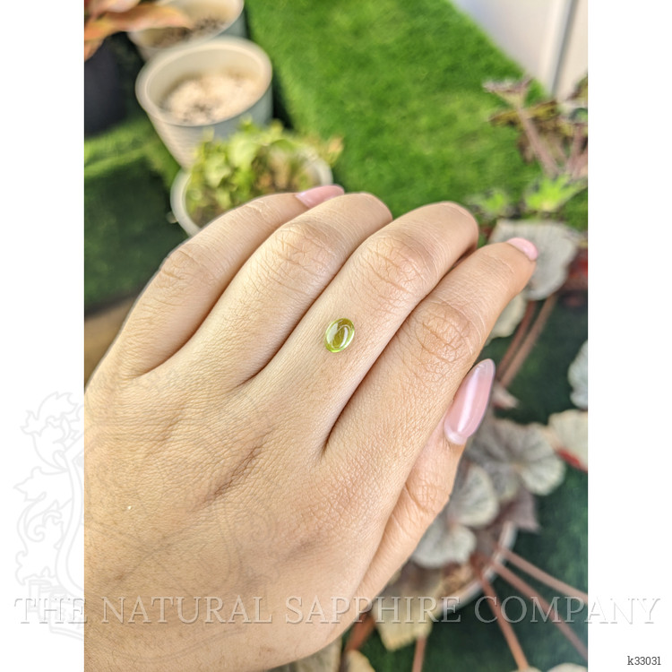 0.74 Ct. Green (Lime Green) Cabochon Peridot from Ceylon (Sri Lanka)