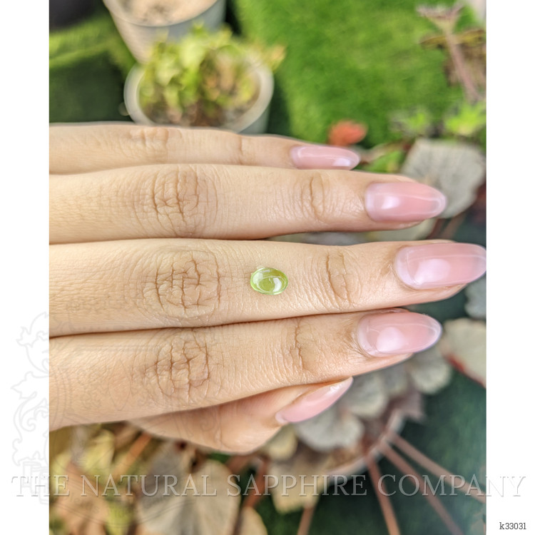 0.74 Ct. Green (Lime Green) Cabochon Peridot from Ceylon (Sri Lanka)