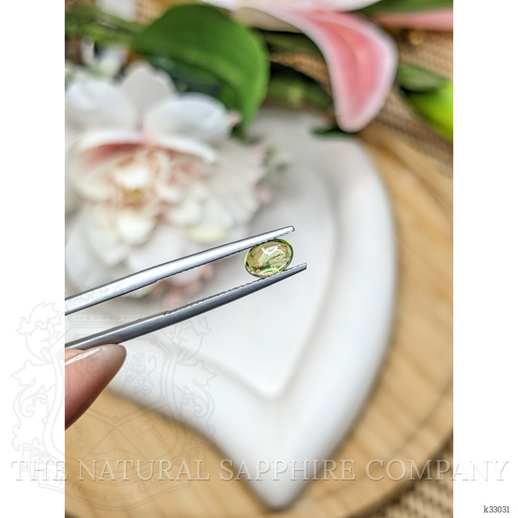 0.74 Ct. Green (Lime Green) Cabochon Peridot from Ceylon (Sri Lanka)