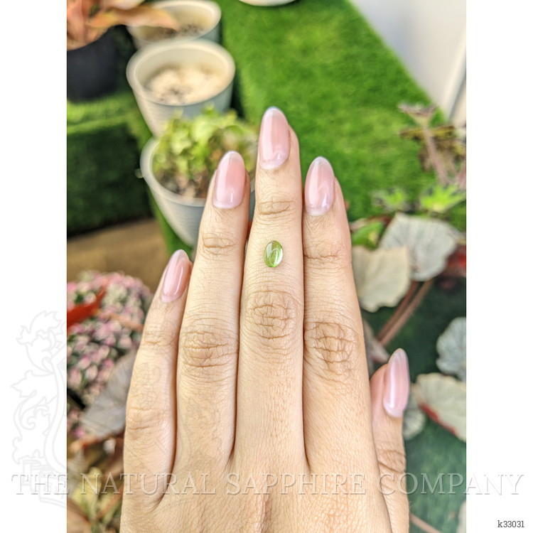 0.74 Ct. Green (Lime Green) Cabochon Peridot from Ceylon (Sri Lanka)