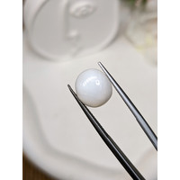 4.91 Ct. White Cabochon Adularescence Moonstone from Ceylon (Sri Lanka) Life Style