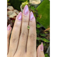 0.44 Ct. Yellowish Green Peridot from Ceylon (Sri Lanka) Life Style