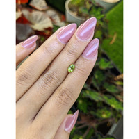 0.61 Ct. Yellowish Green Peridot from Ceylon (Sri Lanka) Life Style