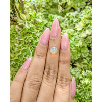 1.05 Ct. Cabochon White Opal from Ethiopia Life Style