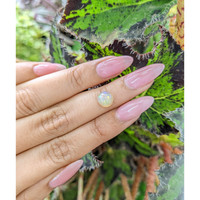 1.05 Ct. Cabochon White Opal from Ethiopia Life Style