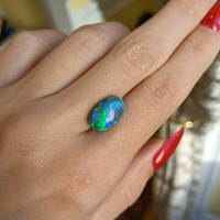 3.93 Ct. Cabochon Black Opal from Australia Life Style