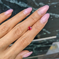 0.58 Ct. Pinkish Red Ruby from Burma (Myanmar) Life Style