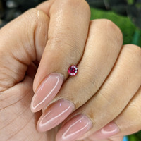 0.27 Ct. Pinkish Red Ruby from Tanzania Life Style
