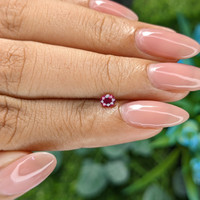0.27 Ct. Pinkish Red Ruby from Tanzania Life Style