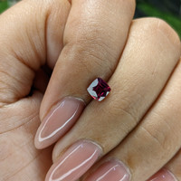 0.64 Ct. Pinkish Red Ruby from Madagascar Life Style