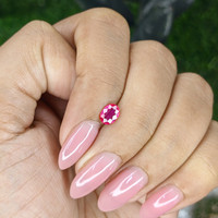 0.57 Ct. Pinkish Red Ruby from Mozambique Life Style