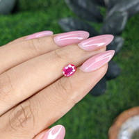 0.57 Ct. Pinkish Red Ruby from Mozambique Life Style