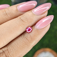 0.49 Ct. Pinkish Red Ruby from Mozambique Life Style