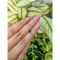 0.72 Ct. Bluish Green Sapphire from Madagascar Life Style