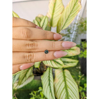 0.72 Ct. Bluish Green Sapphire from Madagascar Life Style