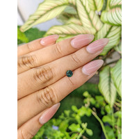 0.72 Ct. Bluish Green Sapphire from Madagascar Life Style