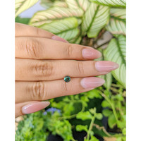 0.63 Ct. Green Sapphire from Madagascar Life Style