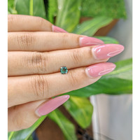 0.53 Ct. Bluish Green Sapphire from Madagascar Life Style