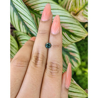 0.81 Ct. Bluish Green Sapphire from Madagascar Life Style